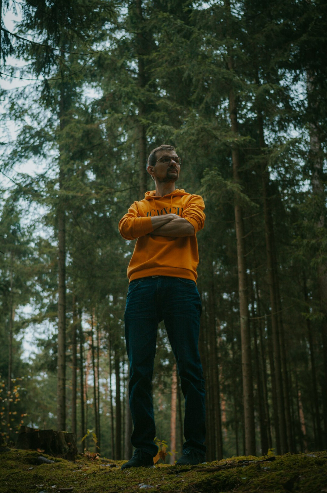 manager practicing mindfulness in forest