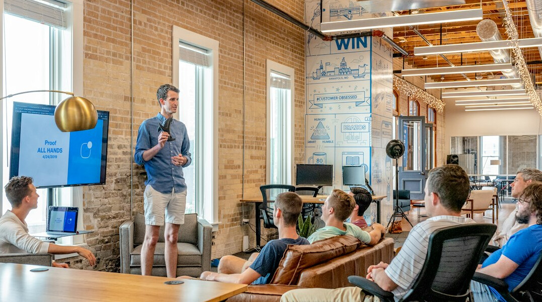 business leader presenting to team